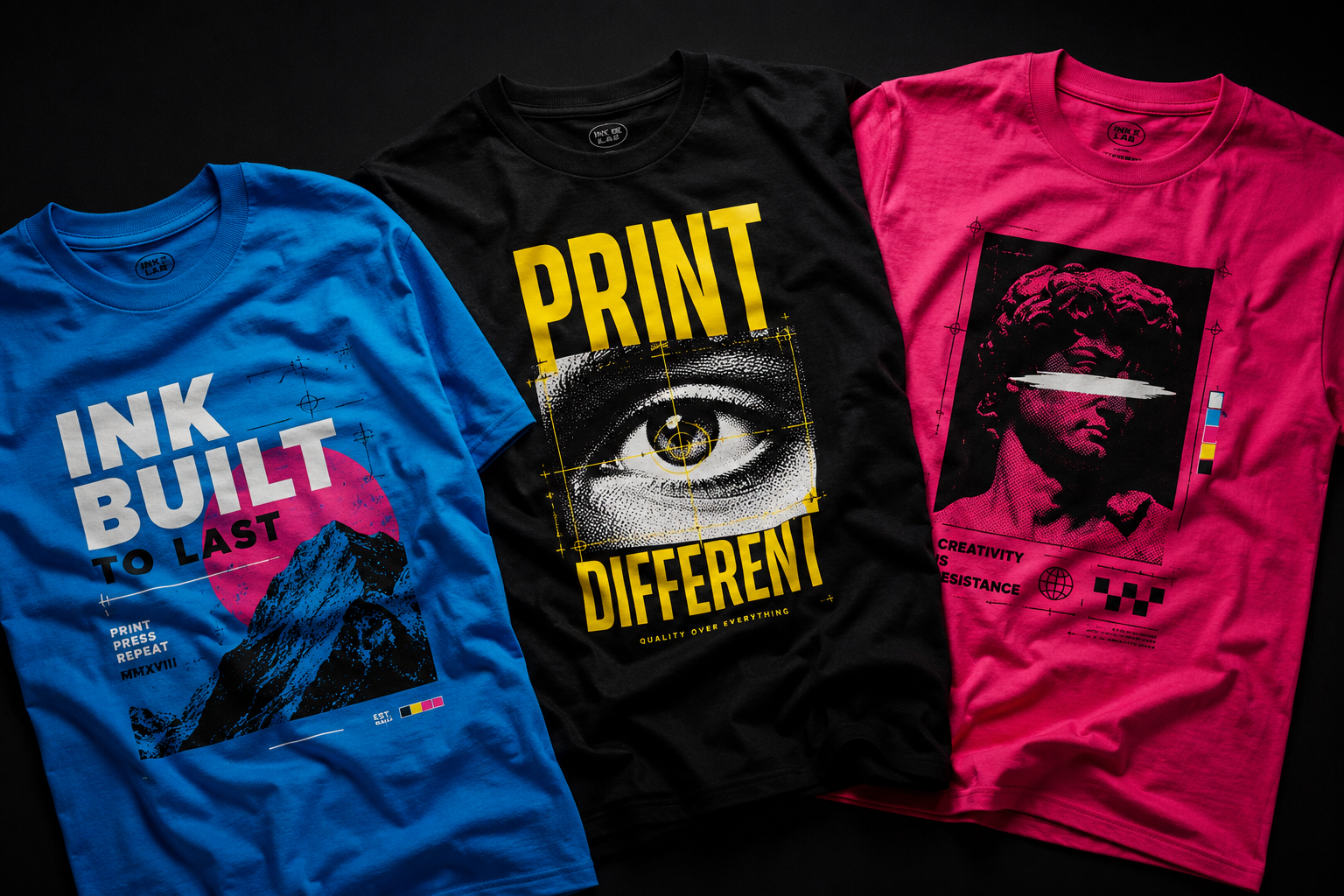 Custom DTF printed shirts in cyan, black and magenta on dark background
